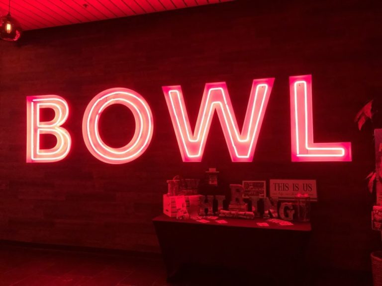 Red neon sign at a bowling alley