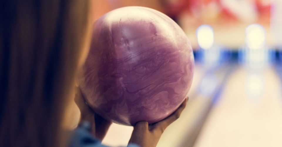 Girl with pink bowling ball